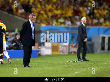 Rio De Janeiro, Brazil. 28th June, 2014. Uruguay's coach Oscar Washington Tabarez (L) looks on during a Round of 16 match between Colombia and Uruguay of 2014 FIFA World Cup at the Estadio do Maracana Stadium in Rio de Janeiro, Brazil, on June 28, 2014. Colombia won 2-0 over Uruguay and qualified for Quarter-finals on Saturday. Credit:  Wang Lili/Xinhua/Alamy Live News Stock Photo