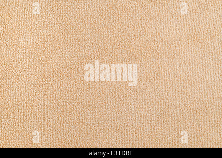 New carpet texture. Bright Beige carpet flooring as seamless background. Stock Photo