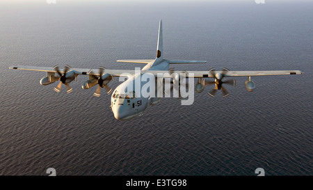 A US Marine Corps KC-130J Super Hercules refueling aircraft flies over the Mediterranean Sea June 19, 2014. Stock Photo