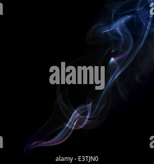 Abstract background with colorful flowing smoke on black Stock Photo