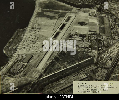 This aerial photograph shows the Consolidated/Convair Aircraft Factory at Lindbergh Field in San Diego, which played a pivotal role in aircraft production during World War II. The facility produced numerous aircraft, including the B-24 Liberator and other key military aircraft. Stock Photo