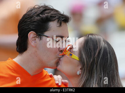 Fortaleza, Brazil. 29th June, 2014. Netherlands's fans kiss before a Round of 16 match between Mexico and Netherlands of 2014 FIFA World Cup at the Estadio Castelao Stadium in Fortaleza, Brazil, on June 29, 2014. Credit:  Zhou Lei/Xinhua/Alamy Live News Stock Photo