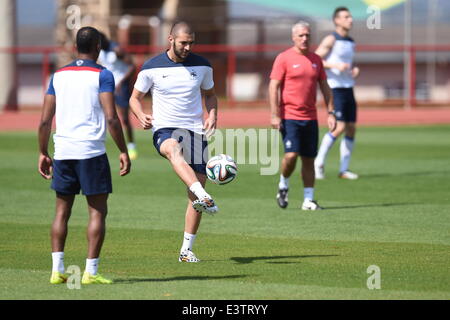 Brasilia, Brazil. 29th June, 2014. France's Karim Benzema (2L) kicks a ball during a training session at the Centro de Capacitacao Fisica dos Bombeiros in Brasilia, Brazil, 29 June 2014. France will face Nigeria in the FIFA World Cup 2014 round of 16 match in Brasilia on 30 June 2014. Photo: Marius Becker/dpa/Alamy Live News