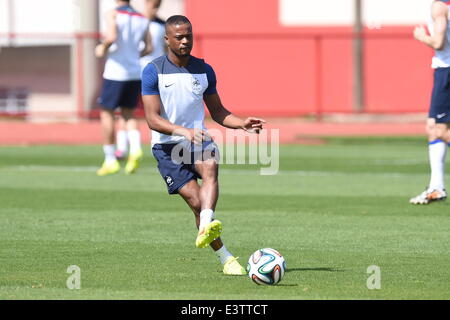 Brasilia, Brazil. 29th June, 2014. France's Patrice Evra plays a ball during a training session at the Centro de Capacitacao Fisica dos Bombeiros in Brasilia, Brazil, 29 June 2014. France will face Nigeria in the FIFA World Cup 2014 round of 16 match in Brasilia on 30 June 2014. Photo: Marius Becker/dpa/Alamy Live News
