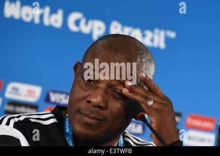 Brasilia, Brazil. 29th June, 2014. Nigeria's national soccer team coach Stephen Keshi gestures during a press conference at the 'Mane Garrincha' National Stadium  in Brasilia, Brazil, 29 June 2014. Nigeria will face France in the FIFA World Cup 2014 round of 16 match in Brasilia on 30 June 2014. Credit:  dpa picture alliance/Alamy Live News