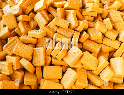 Newly pressed Ecstasy pills called  'Gold Bars' containing around 200mg of MDMA (3,4-methylenedioxy-N-methylamphetamine).