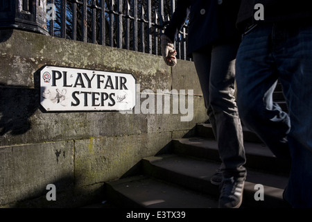 A couple walks at Playfair Steps in Edinburgh, Scotland Stock Photo