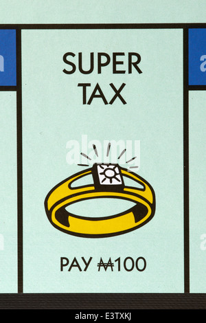 Super Tax on a Monopoly Game Board Stock Photo