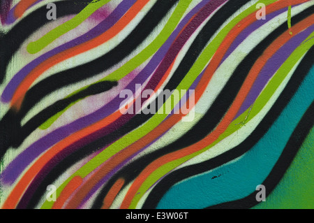 Abstract colorful lines pattern artistic background. Graffiti spray paint on wall texture. Stock Photo