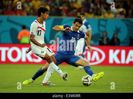Recife, Brazil. 29th June, 2014. World Cup 2nd Round. Costa Rica versus Greece. Tejeda challenged by Karagounis Credit:  Action Plus Sports/Alamy Live News Stock Photo