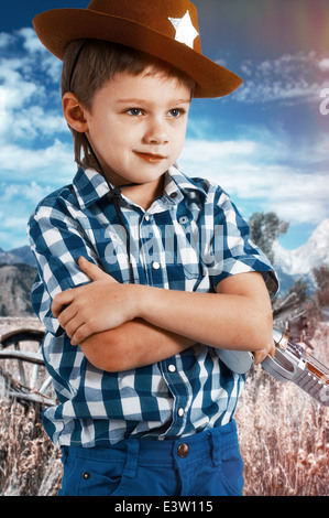 Young boy in cowboy hat Stock Photo