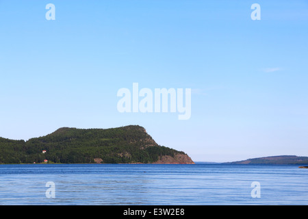 View on Norwegian fjord and mountain range at sunny day Stock Photo