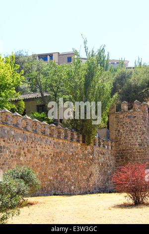 Medieval city walls surrounding the old town of Toledo, Spain. Stock Photo