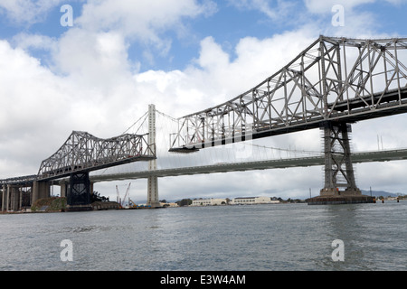 The old eastern span of the San Francisco - Oakland Bay Bridge is disassembled in April of 2014. Stock Photo