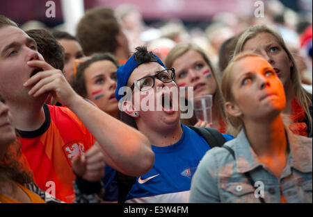 Rotterdam, Netherlands. 29th June, 2014. Football fans watch the televised match of the Netherlands with Mexico in the Brazil World Cup finals, in downtown Rotterdam, the Netherlands, on June 29, 2014. The Netherlands beat Mexico 2-1 on Sunday to enter the quarterfinals. © Robin Utrecht/Xinhua/Alamy Live News Stock Photo