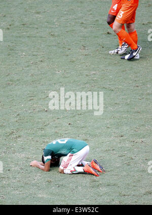 Fortaleza, Brazil. 29th June, 2014. Mexico's Javier Aquino (front) reacts after a Round of 16 match between Netherlands and Mexico of 2014 FIFA World Cup at the Estadio Castelao Stadium in Fortaleza, Brazil, on June 29, 2014. Netherlands won 2-1 over Mexico and qualified for Quarter-finals on Sunday. Credit:  Liao Yujie/Xinhua/Alamy Live News Stock Photo