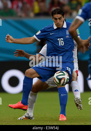 (140629) -- RECIFE, June 29, 2014 (Xinhua) -- Greece's Lazaros Christodoulopoulos vies for the ball during a Round of 16 match between Costa Rica and Greece of 2014 FIFA World Cup at the Arena Pernambuco Stadium in Recife, Brazil, on June 29, 2014.(Xinhua/Guo Yong)(rh) Stock Photo