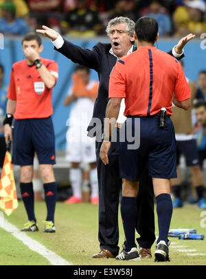 Recife, Brazil. 29th June, 2014. Greece's coach Fernando Santos (C) reacts during a Round of 16 match between Costa Rica and Greece of 2014 FIFA World Cup at the Arena Pernambuco Stadium in Recife, Brazil, on June 29, 2014. Credit:  Lui Siu Wai/Xinhua/Alamy Live News Stock Photo