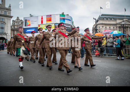 Soldiers marching in Piccadilly Circus at Pride in London 2014 Stock Photo
