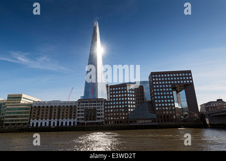 View from the River Thames. Late afternoon sun lights up the London skyline. The Shard is the tallest skyscraper in Western Euro Stock Photo
