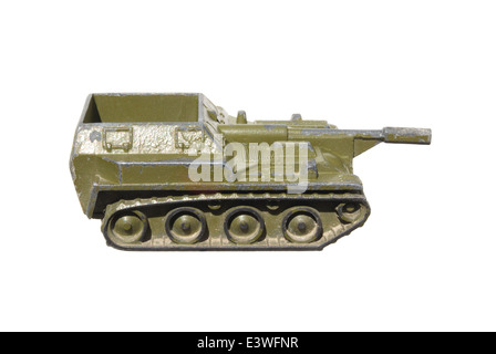 Children's toy: a very old self-propelled Artillery installation of metal green isolated on white background. Stock Photo