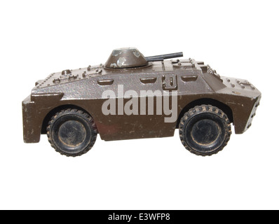 Children's toy: a very old toy tank metal green isolated on white background. Stock Photo