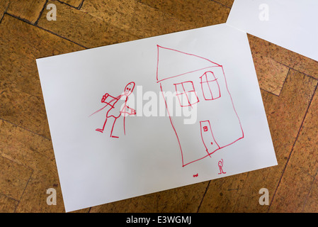 Young child's drawing in red marker of house and people. Children's Cultural Festival, Reykjavik, Iceland Stock Photo
