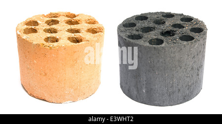 used and new coal briquette on a white background Stock Photo