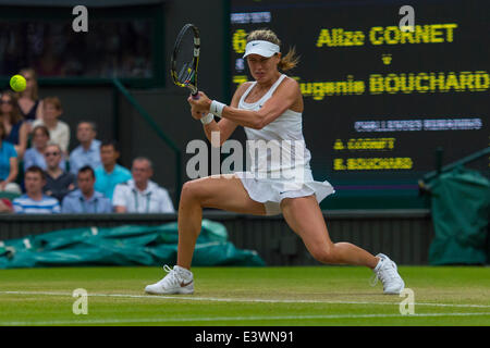 London, UK. 30th June, 2014. Wimbledon Championships Day Seven Eugenie Bouchard of Canada in action against Alize Cornet of France during day seven ladies singles fourth round match at the Wimbledon Tennis Championships at The All England Lawn Tennis Club in London, United Kingdom Credit:  Action Plus Sports/Alamy Live News Stock Photo