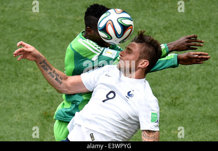 Brasilia, Brazil. 30th June, 2014. France's Olivier Giroud vies with Nigeria's Kenneth Omeruo during a Round of 16 match between France and Nigeria of 2014 FIFA World Cup at the Estadio Nacional Stadium in Brasilia, Brazil, on June 30, 2014.  Credit:  Liu Dawei/Xinhua/Alamy Live News Stock Photo