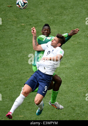 Brasilia, Brazil. 30th June, 2014. France's Olivier Giroud vies with Nigeria's Kenneth Omeruo during a Round of 16 match between France and Nigeria of 2014 FIFA World Cup at the Estadio Nacional Stadium in Brasilia, Brazil, on June 30, 2014.  Credit:  Liu Dawei/Xinhua/Alamy Live News Stock Photo