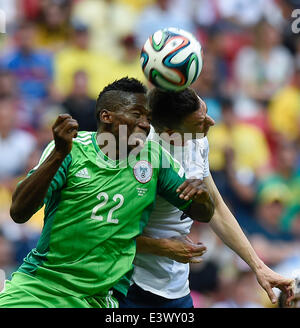 Brasilia, Brazil. 30th June, 2014. France's Olivier Giroud vies with Nigeria's Kenneth Omeruo during a Round of 16 match between France and Nigeria of 2014 FIFA World Cup at the Estadio Nacional Stadium in Brasilia, Brazil, on June 30, 2014.  Credit:  Xinhua/Alamy Live News Stock Photo