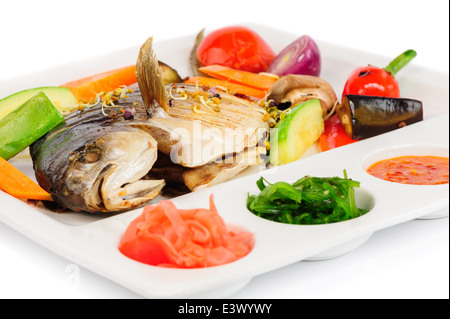 fried wish with grilled vegetables and sauces Stock Photo