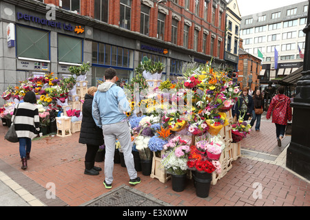 A view of flower stalls on Grafton Street in Dublin city Stock Photo