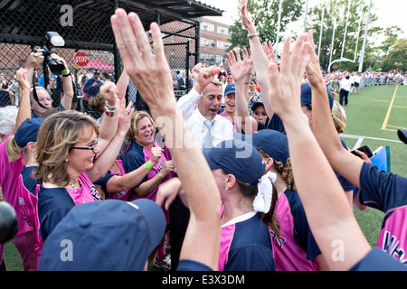 US House Speaker John Boehner joins the republican Congresswomen for a pre-game rally prior to the Congressional Women’s Softball game at Watkins Recreation Center June 18, 2014 in Washington, DC. Stock Photo