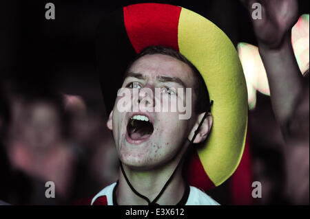 Freiburg, Germany. 30th June, 2014. Thousands of football fans watch the FIFA World Cup 2014 game between Germany and Algeria, broadcast at a large public viewing area in Freiburg. Germany wins 2-1. Photo: Miroslav Dakov/ Alamy Live News Stock Photo