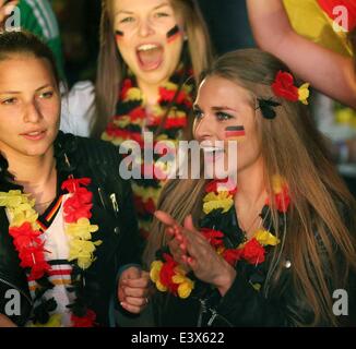 (140701) -- FRANKFURT, July 1, (Xinhua) -- German football fans react as they watch the 2014 World Cup round of 16 soccer match between Germany and Algeria at a public viewing event in Frankfurt, Germany, June 30, 2014. © Xinhua/Alamy Live News Stock Photo