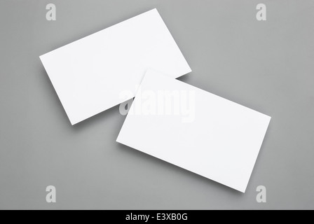 blank business cards on grey background Stock Photo