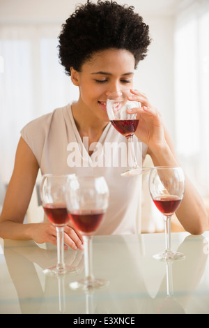 Black woman tasting wine Stock Photo