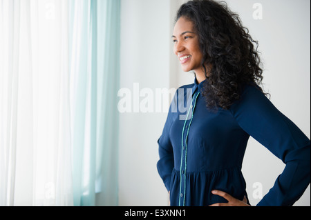 Mixed race woman smiling Stock Photo