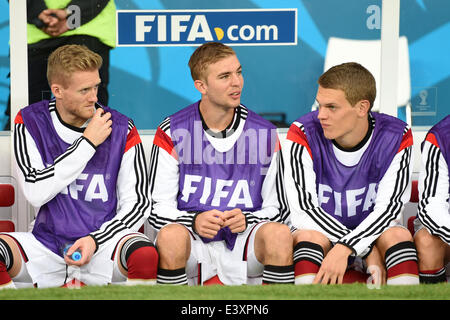 Porto Alegre, Brazil. 30th June, 2014. Germany's substitute players (L-R) Andre Schuerrle, Christoph Kramer and Matthias Ginter sit at the bench prior to the FIFA World Cup 2014 round of 16 match between Germany and Algeria at the Estadio Beira-Rio in Porto Alegre, Brazil, 30 June 2014. Photo: Andreas Gebert/dpa/Alamy Live News Stock Photo