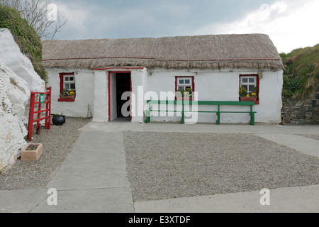 Street lined with crofters ( thatched cottages ), Doagh Famine Village, Lagacurry, Inishowen Peninsula, County Donegal, Ireland. Stock Photo