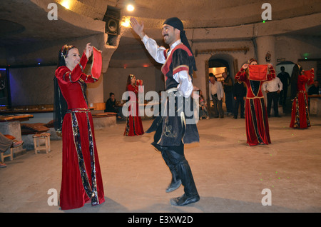 An evening of dancingand entertainment after visiting thefairy tale houses &churches of Cappadocia.They are local entertainers. Stock Photo