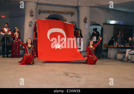 An evening of dancingand entertainment after visiting thefairy tale houses &churches of Cappadocia.The show ends patriotic note Stock Photo