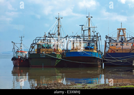 Moored fishing trawlers at Moville pier, on Lough Foyle at the edge of the Atlantic, Inishowen Peninsula, Donegal, Ireland. Stock Photo