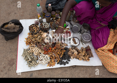 Woman selling herbal remedies on the street Stock Photo