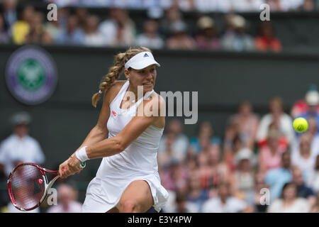 London, UK. 01st July, 2014. Wimbledon Championships Day Eight Angelique Kerber of Germany in action against Maria Sharapova of Russia during day eight ladies singles fourth round match at the Wimbledon Tennis Championships at The All England Lawn Tennis Club in London, United Kingdom Credit:  Action Plus Sports/Alamy Live News Stock Photo