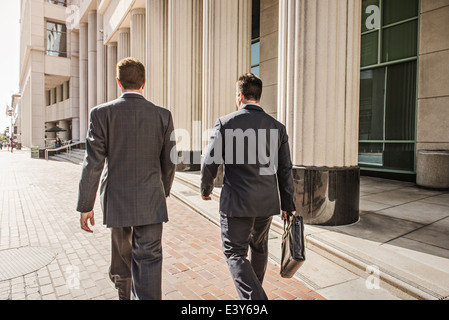 Two business lawyers with briefcase outside courthouse Stock Photo