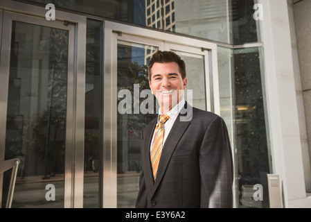 Portrait of business lawyer outside courthouse Stock Photo