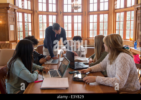 College students using laptops Stock Photo